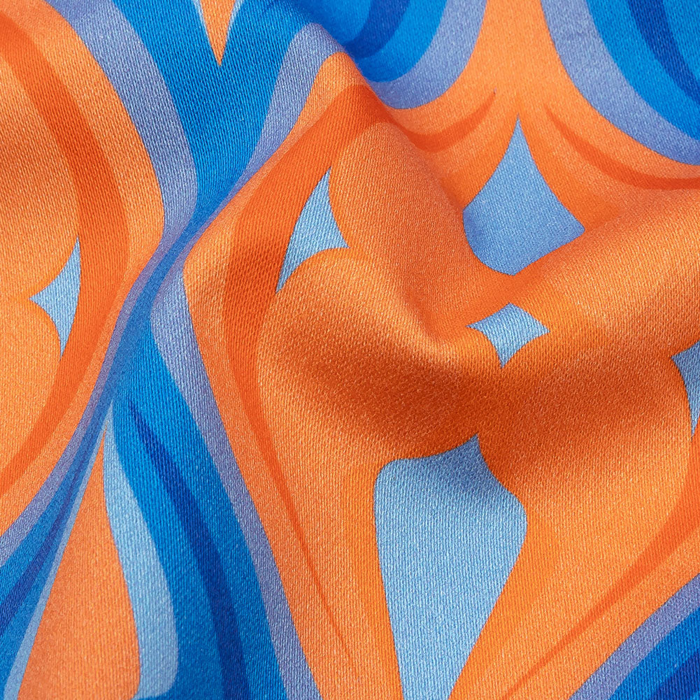 Stretch Cotton Sateen - Blue and Orange Ogees - Eye of the Storm Print - Mood Exclusive Groove Collection Stretch Cotton Sateen - Blue and Orange Ogees - Eye of the Storm Print - Mood Exclusive Groove Collection