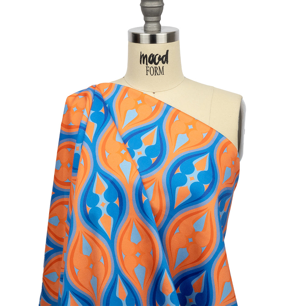 Stretch Cotton Sateen - Blue and Orange Ogees - Eye of the Storm Print - Mood Exclusive Groove Collection Stretch Cotton Sateen - Blue and Orange Ogees - Eye of the Storm Print - Mood Exclusive Groove Collection