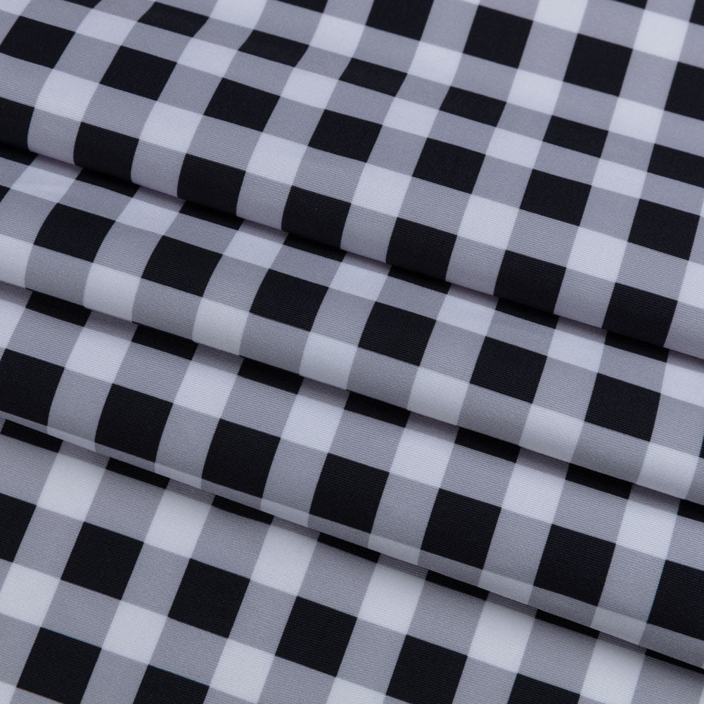 Compression Swimwear Tricot, UV Protective with Aloe Vera Microcapsules - Black and White Checkered - Caye Collection Folded Compression Swimwear Tricot, UV Protective with Aloe Vera Microcapsules - Black and White Checkered - Caye Collection Folded