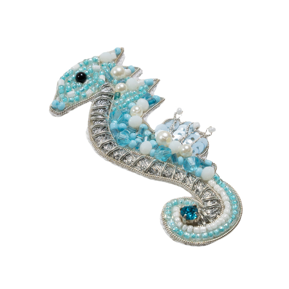 Aqua, Silver and White Baby Seahorse Sequins and Glass Beaded Applique - 3.125" x 1.375" Folded Aqua, Silver and White Baby Seahorse Sequins and Glass Beaded Applique - 3.125" x 1.375" Folded