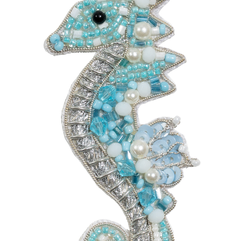 Aqua, Silver and White Baby Seahorse Sequins and Glass Beaded Applique - 3.125" x 1.375" Detail Aqua, Silver and White Baby Seahorse Sequins and Glass Beaded Applique - 3.125" x 1.375" Detail