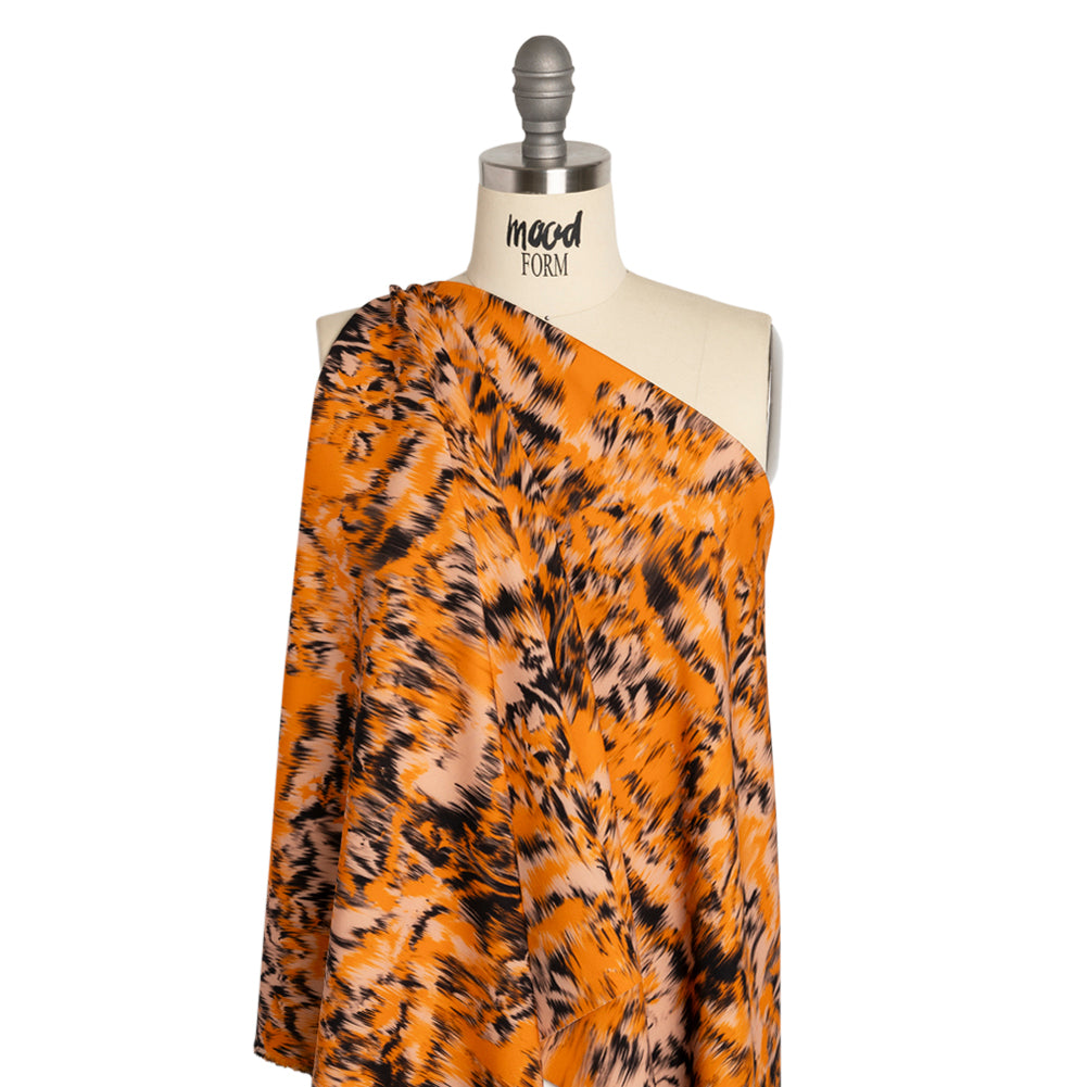 Stretch Polyester Woven Print - Orange and Black Abstract Ikat - Mood Exclusive Shifting Sands Drape Stretch Polyester Woven Print - Orange and Black Abstract Ikat - Mood Exclusive Shifting Sands Drape