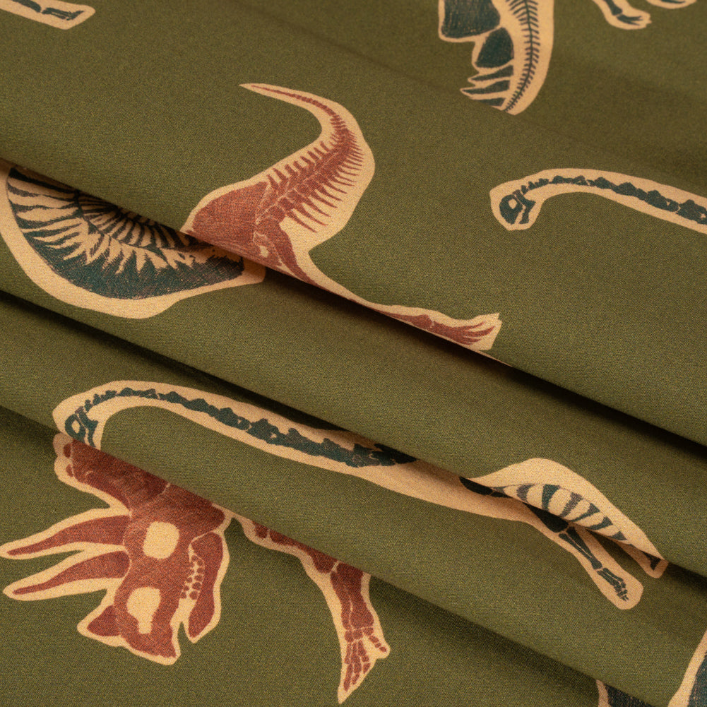 Stretch Cotton Poplin Print - Olive, Navy and Rust Dinosaur Bones and Fossils - Mood Exclusive Discovery Dig Folded Stretch Cotton Poplin Print - Olive, Navy and Rust Dinosaur Bones and Fossils - Mood Exclusive Discovery Dig Folded