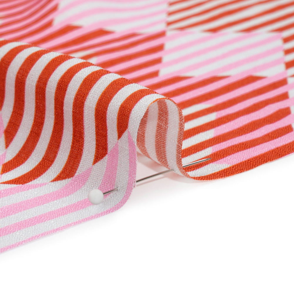 Slubbed Viscose Woven Print - Red and Pink Geometric Stripes - Mood Exclusive Eye Play Detail Slubbed Viscose Woven Print - Red and Pink Geometric Stripes - Mood Exclusive Eye Play Detail