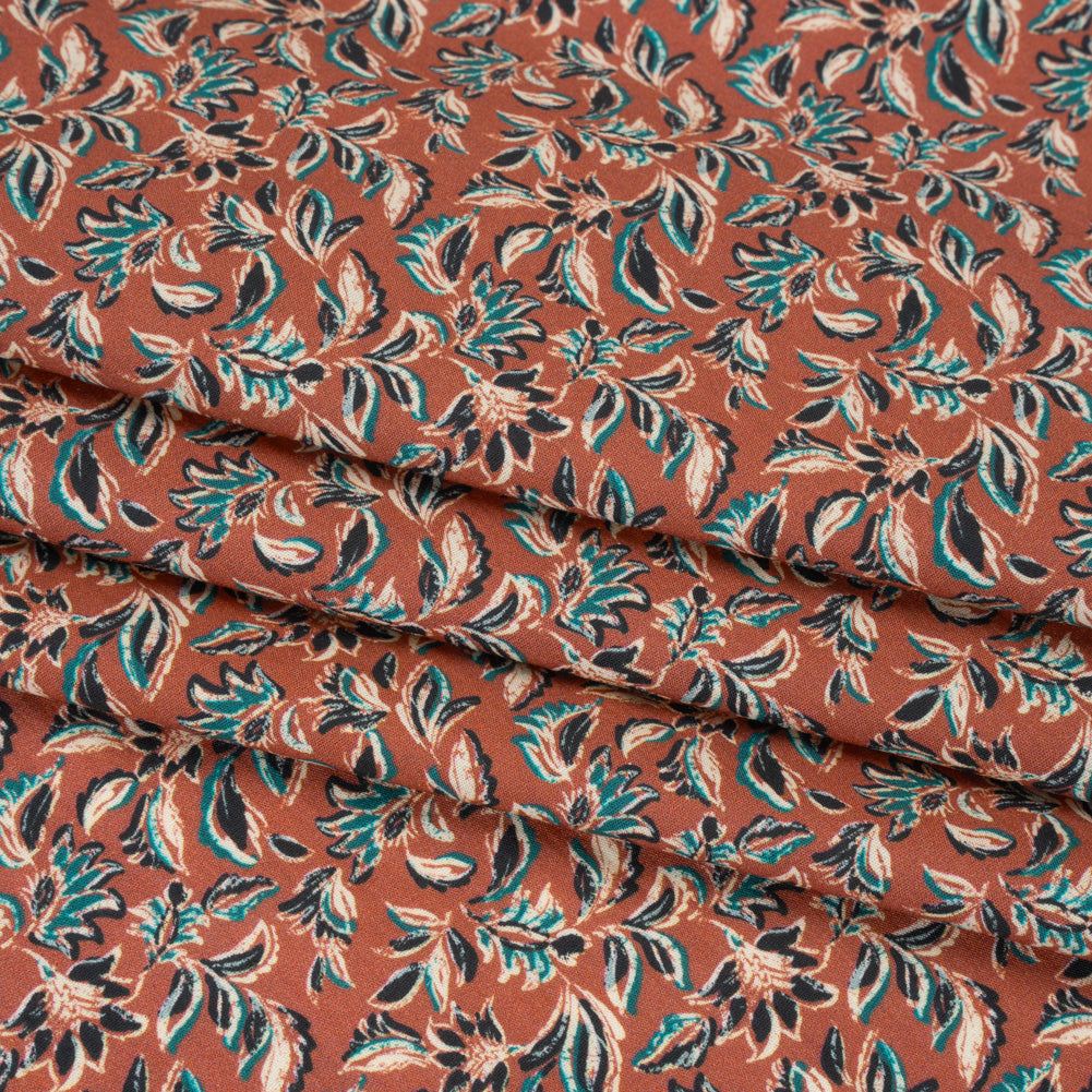 Cotton Poplin Print - Burnt Orange and Teal Leaves - Mood Exclusive Cranberry Corral - Folded Cotton Poplin Print - Burnt Orange and Teal Leaves - Mood Exclusive Cranberry Corral - Folded