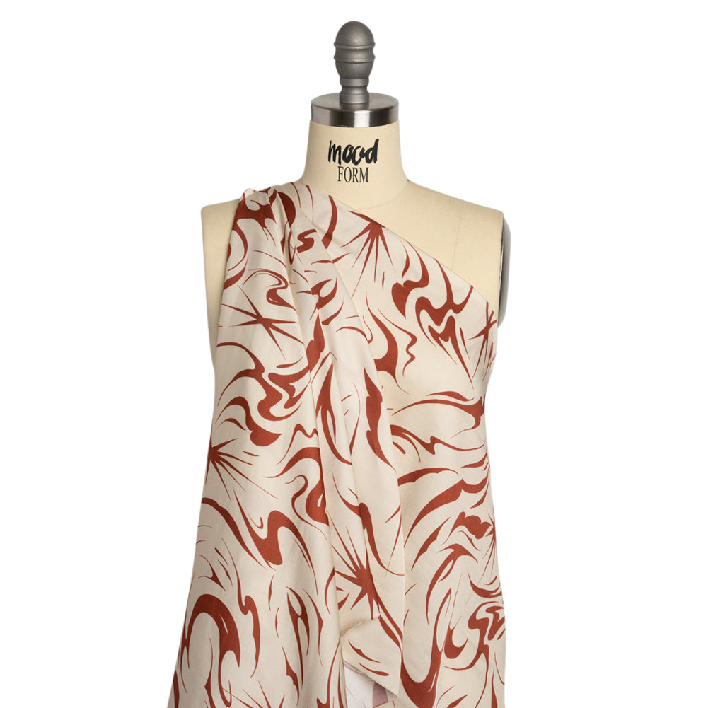Sustainable and Recycled Viscose Satin Print - Red and Cream Swirls and Stars - Mood Exclusive Vincent's Hope Detail Sustainable and Recycled Viscose Satin Print - Red and Cream Swirls and Stars - Mood Exclusive Vincent's Hope Detail