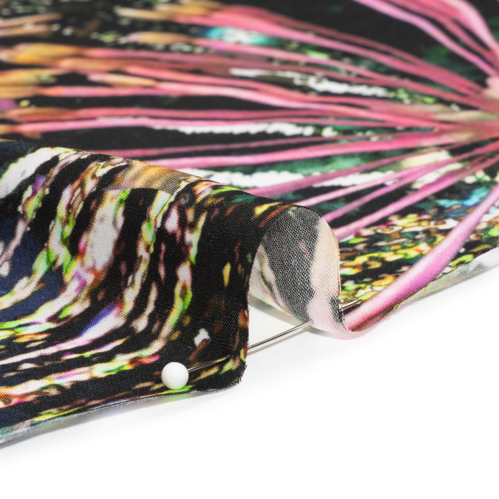 Sustainable and Recycled Viscose Satin Print - Pink, Orange and Black Fireworks and Flowers - Mood Exclusive Mirrored in Nature Folded Sustainable and Recycled Viscose Satin Print - Pink, Orange and Black Fireworks and Flowers - Mood Exclusive Mirrored in Nature Folded