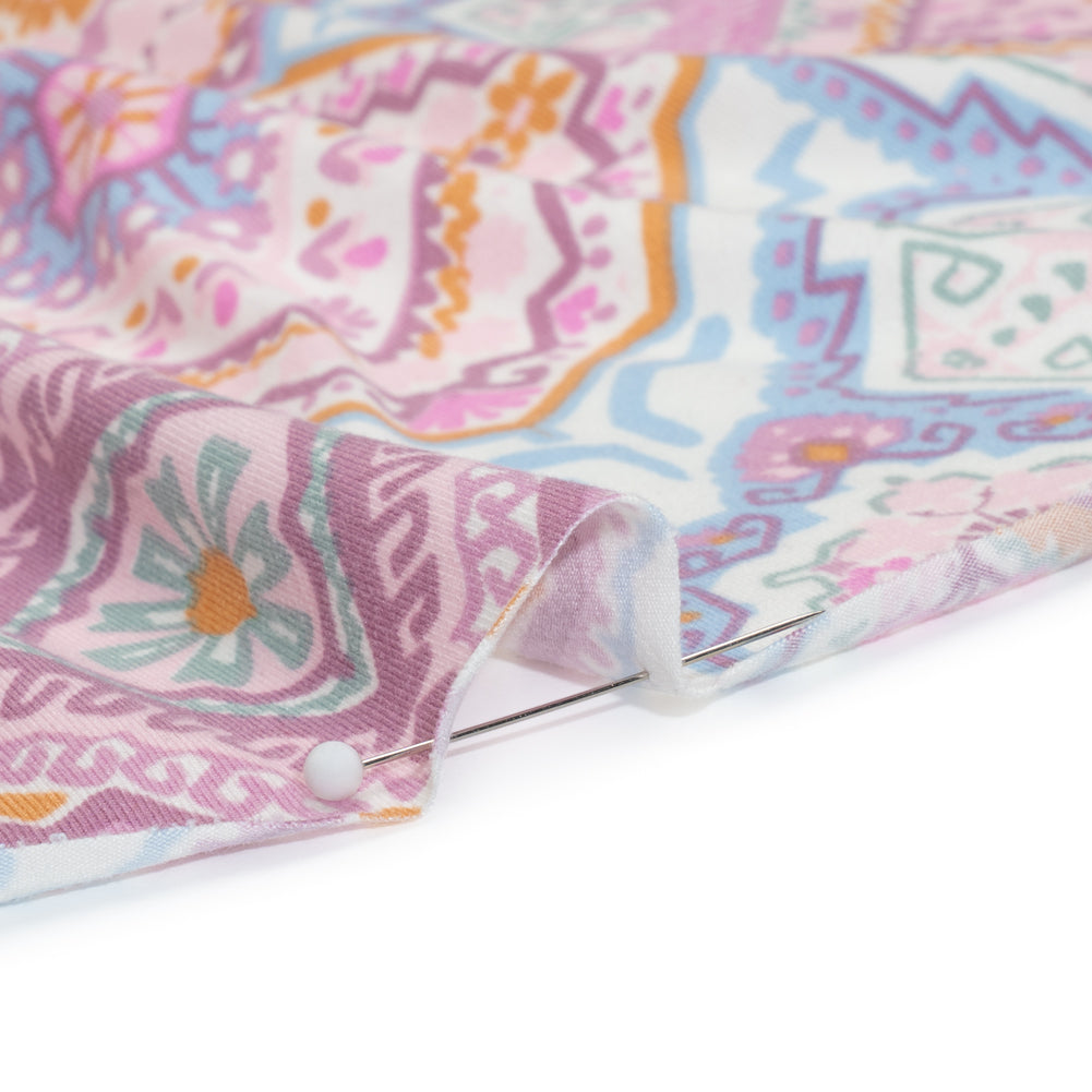 Stretch Polyester Jersey - Pale Pink, Baby Blue, and Golden Yellow Geometric Medallions Detail Stretch Polyester Jersey - Pale Pink, Baby Blue, and Golden Yellow Geometric Medallions Detail