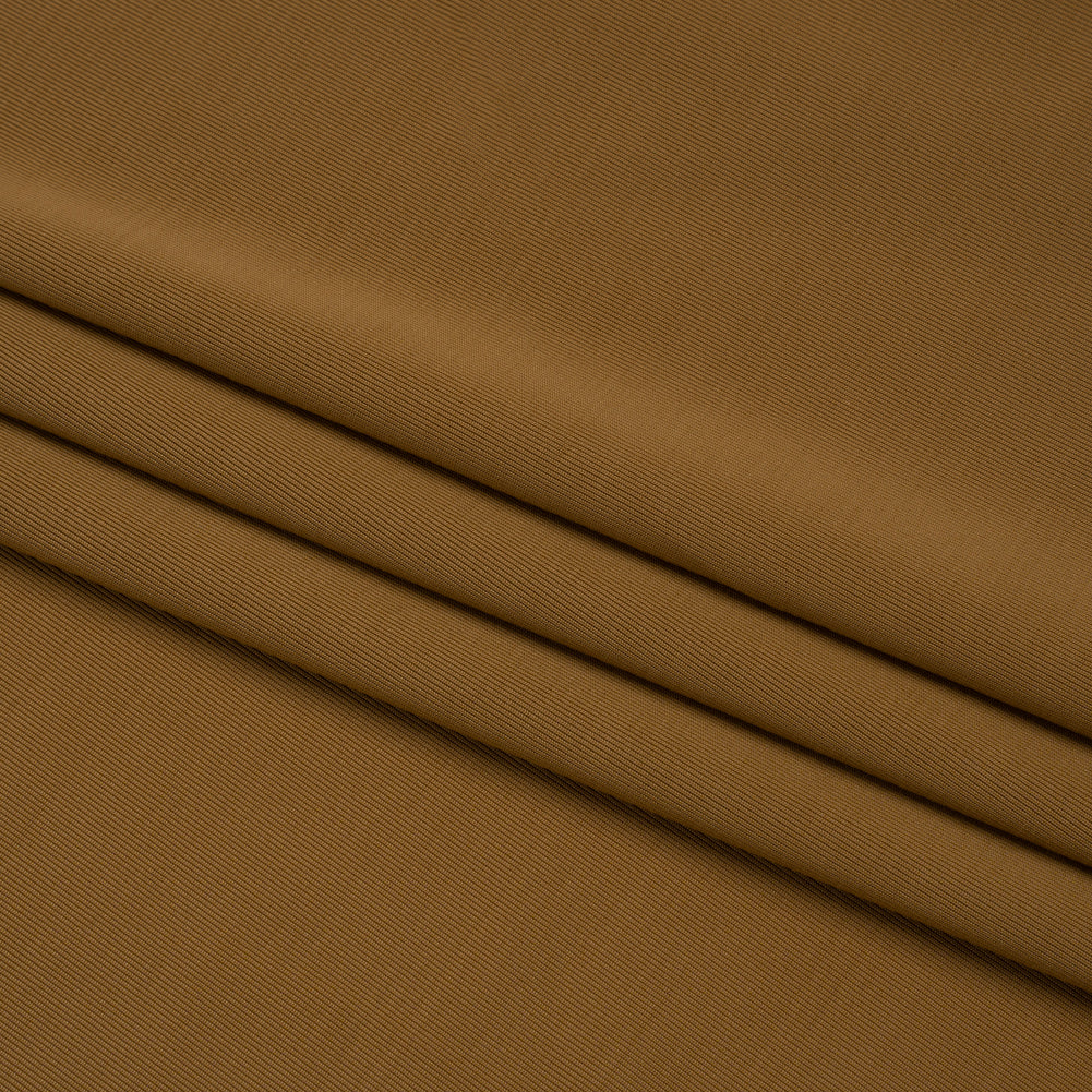 Famous Australian Designer Gold Stretch Polyester Jersey Folded Famous Australian Designer Gold Stretch Polyester Jersey Folded