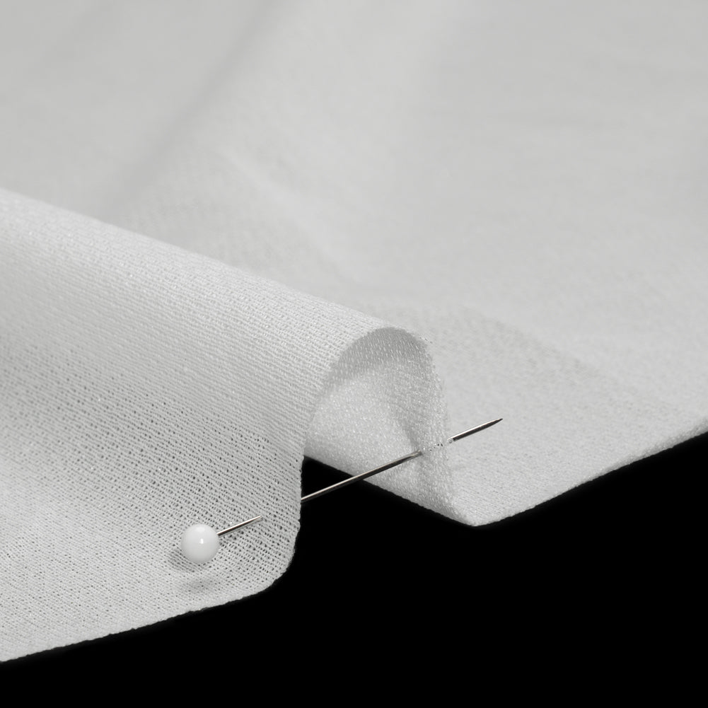 Lightweight Knit Fusible Interlining Single Side by Helmut Lang - White Detail Lightweight Knit Fusible Interlining Single Side by Helmut Lang - White Detail
