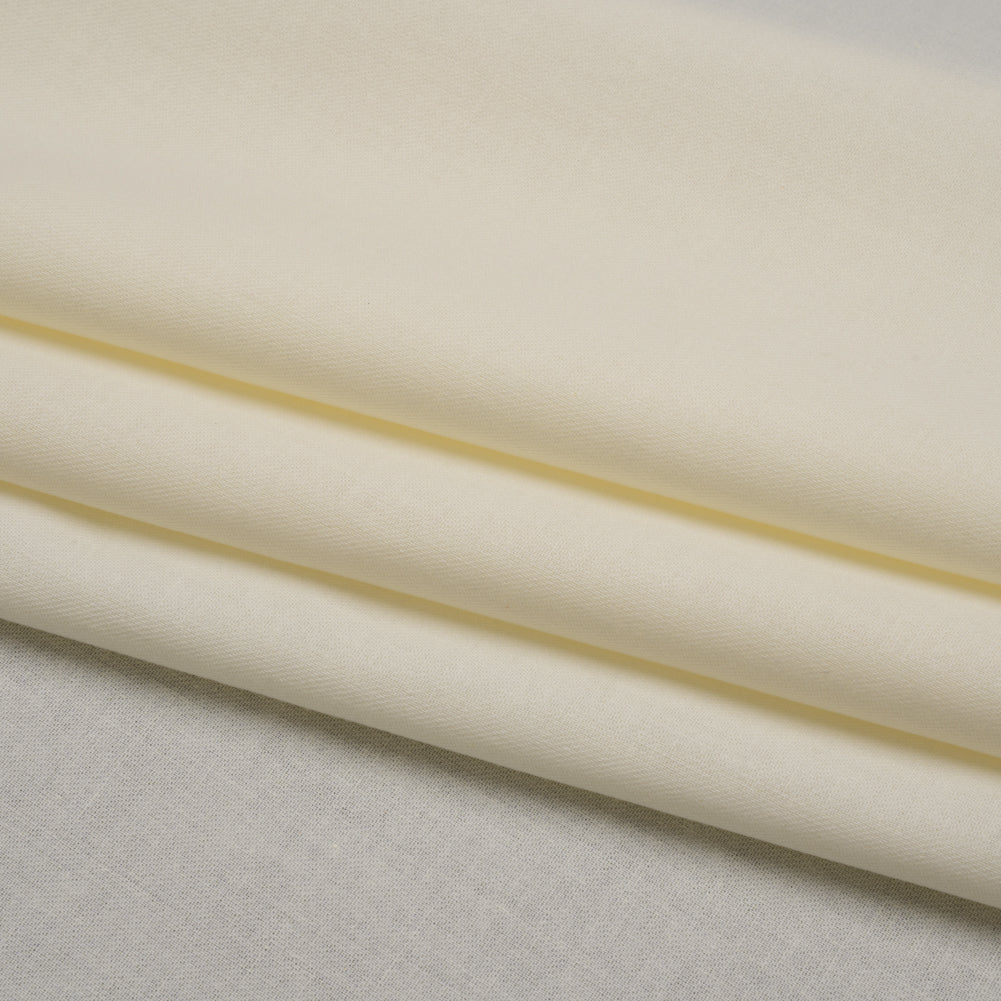 Poly-Cotton Twill Pocketing Fabric by Theory - Ivory Folded Poly-Cotton Twill Pocketing Fabric by Theory - Ivory Folded