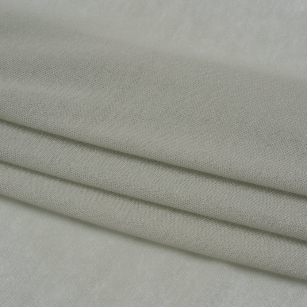Lightweight Cotton Interlock Knit - Honeydew Green - Designer Deadstock Folded Lightweight Cotton Interlock Knit - Honeydew Green - Designer Deadstock Folded