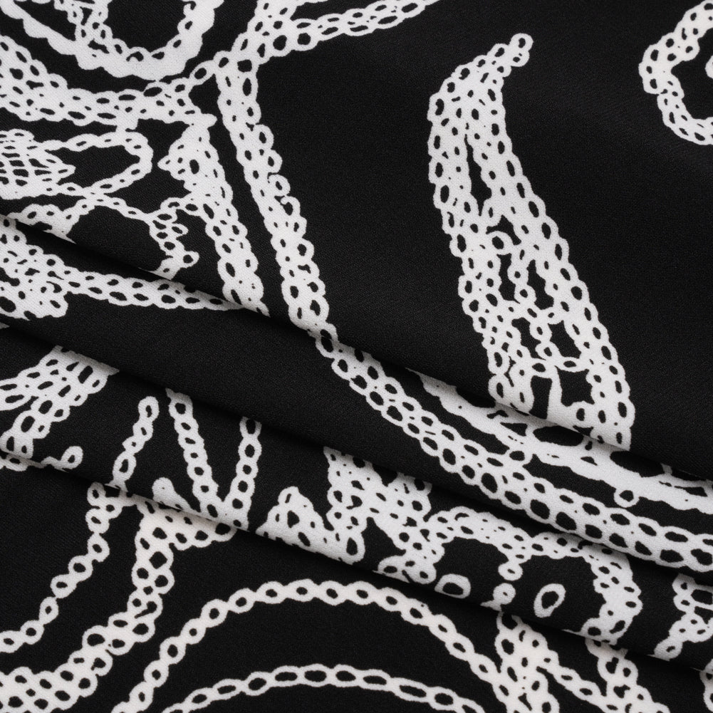 Stretch Polyester Tricot - Black and White Chain Stitch Flowers - Designer Deadstock Stretch Polyester Tricot - Black and White Chain Stitch Flowers - Designer Deadstock