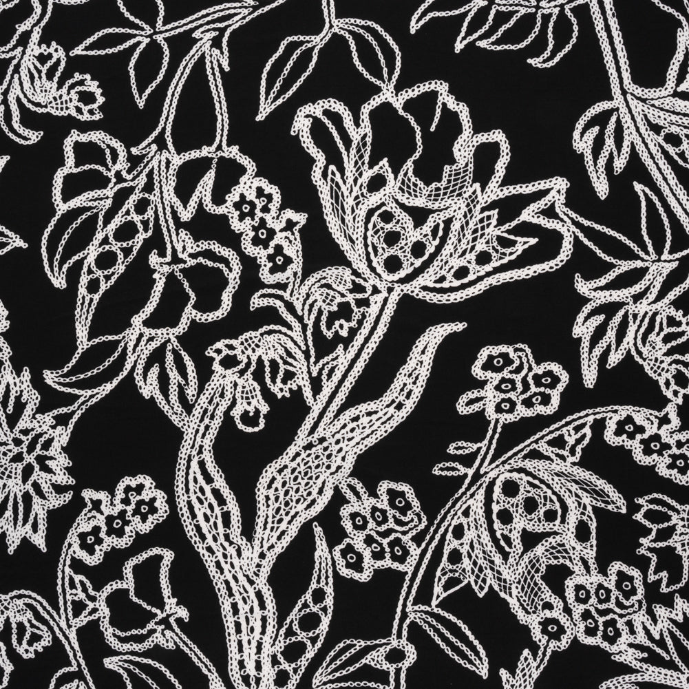 Stretch Polyester Tricot - Black and White Chain Stitch Flowers - Designer Deadstock Stretch Polyester Tricot - Black and White Chain Stitch Flowers - Designer Deadstock