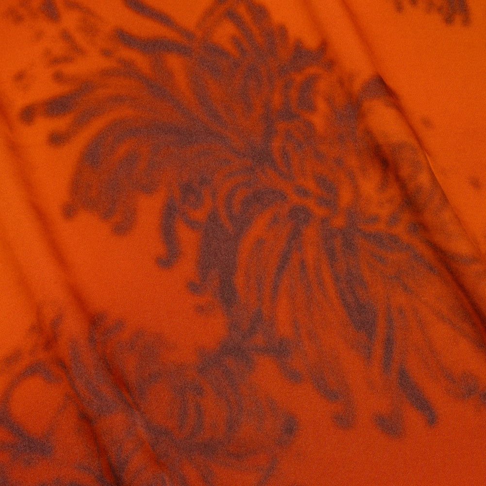 Satin-Faced Rayon Twill - Orange and Black Hazy Florals - Made in Italy Satin-Faced Rayon Twill - Orange and Black Hazy Florals - Made in Italy