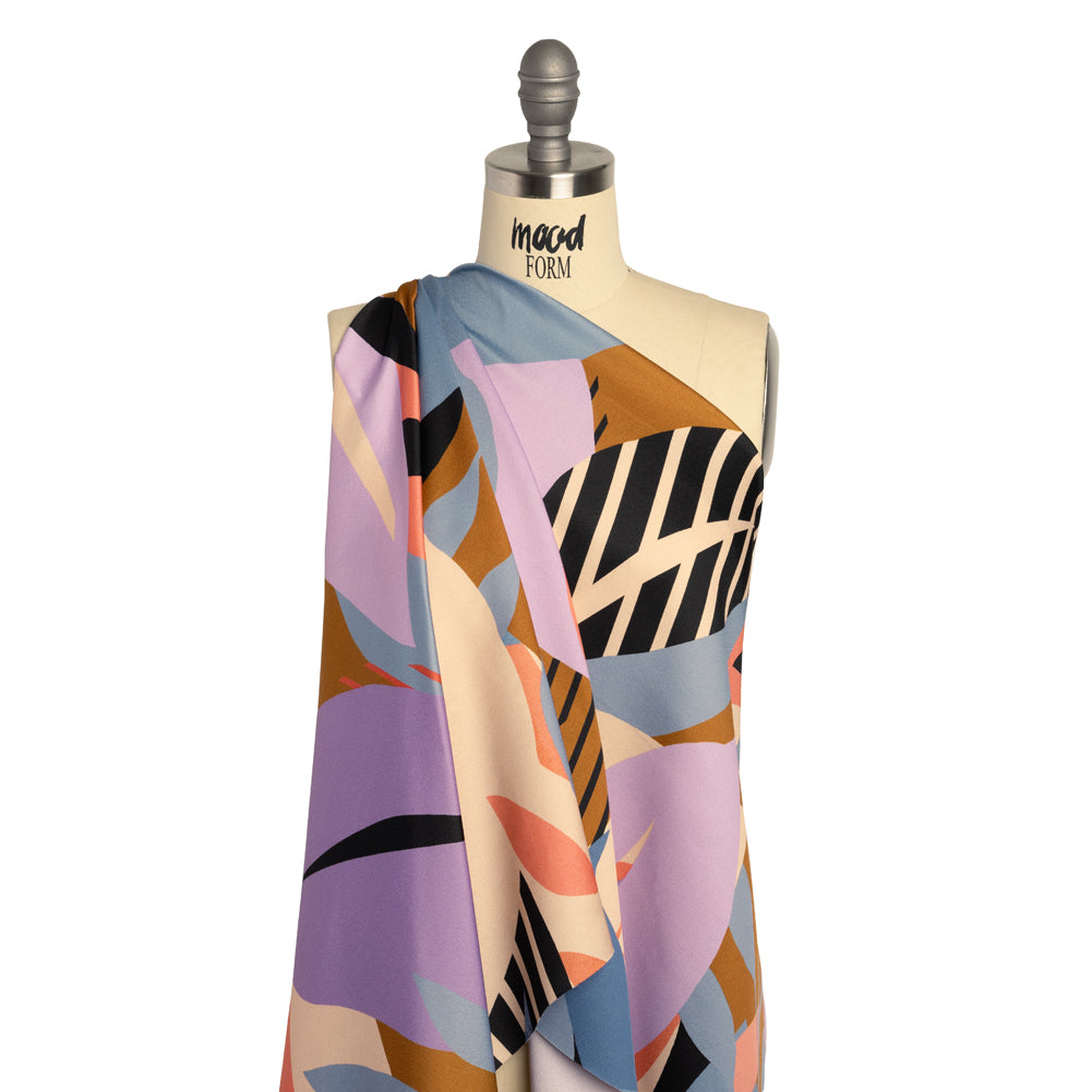 Polyester Crepe Back Satin - Blue, Lavender and Beige Leaves - Made in Italy Drape Polyester Crepe Back Satin - Blue, Lavender and Beige Leaves - Made in Italy Drape