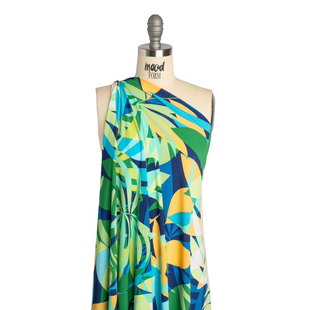 Stretch Polyester Tricot - Green, Blue and Goldenrod Overlapping Palm Leaves - Designer Deadstock Stretch Polyester Tricot - Green, Blue and Goldenrod Overlapping Palm Leaves - Designer Deadstock