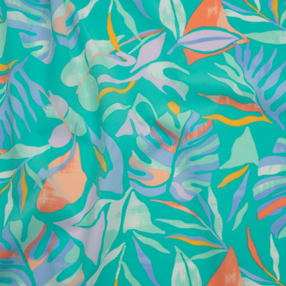 Stretch Nylon Crepe Print - Bright Teal, Periwinkle and Orange Tropical Leaves - Deadstock Stretch Nylon Crepe Print - Bright Teal, Periwinkle and Orange Tropical Leaves - Deadstock