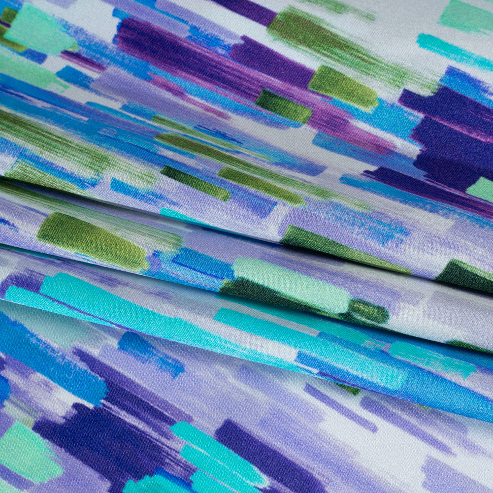 Silk Charmeuse Print 16MM, Made in Italy - Lavender, Blue and Green Painted Striations - Folded Silk Charmeuse Print 16MM, Made in Italy - Lavender, Blue and Green Painted Striations - Folded