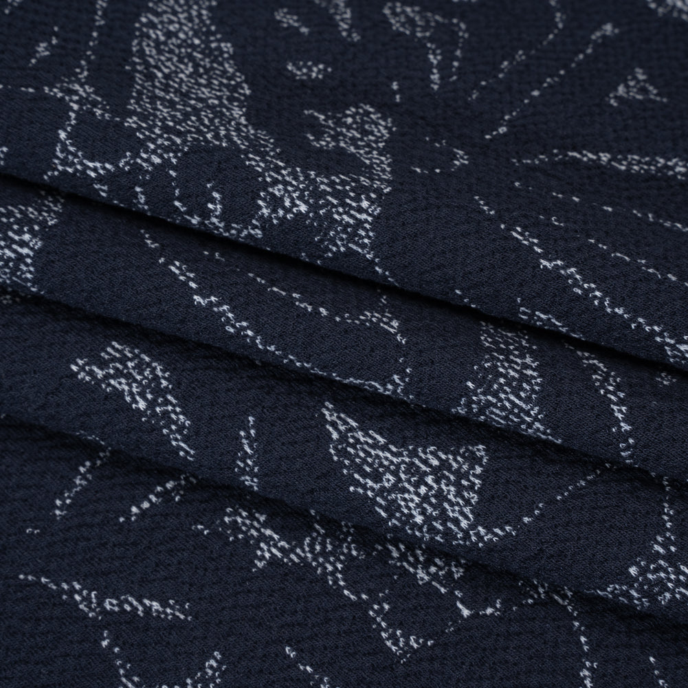 Puckered Polyester Jacquard Knit - Navy and Ivory Floral - Designer Deadstock - Folded Puckered Polyester Jacquard Knit - Navy and Ivory Floral - Designer Deadstock - Folded