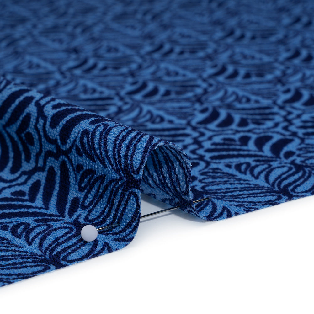 Stretch Polyester Crepe - Blue and Navy Leaf Motifs - Designer Deadstock Stretch Polyester Crepe - Blue and Navy Leaf Motifs - Designer Deadstock