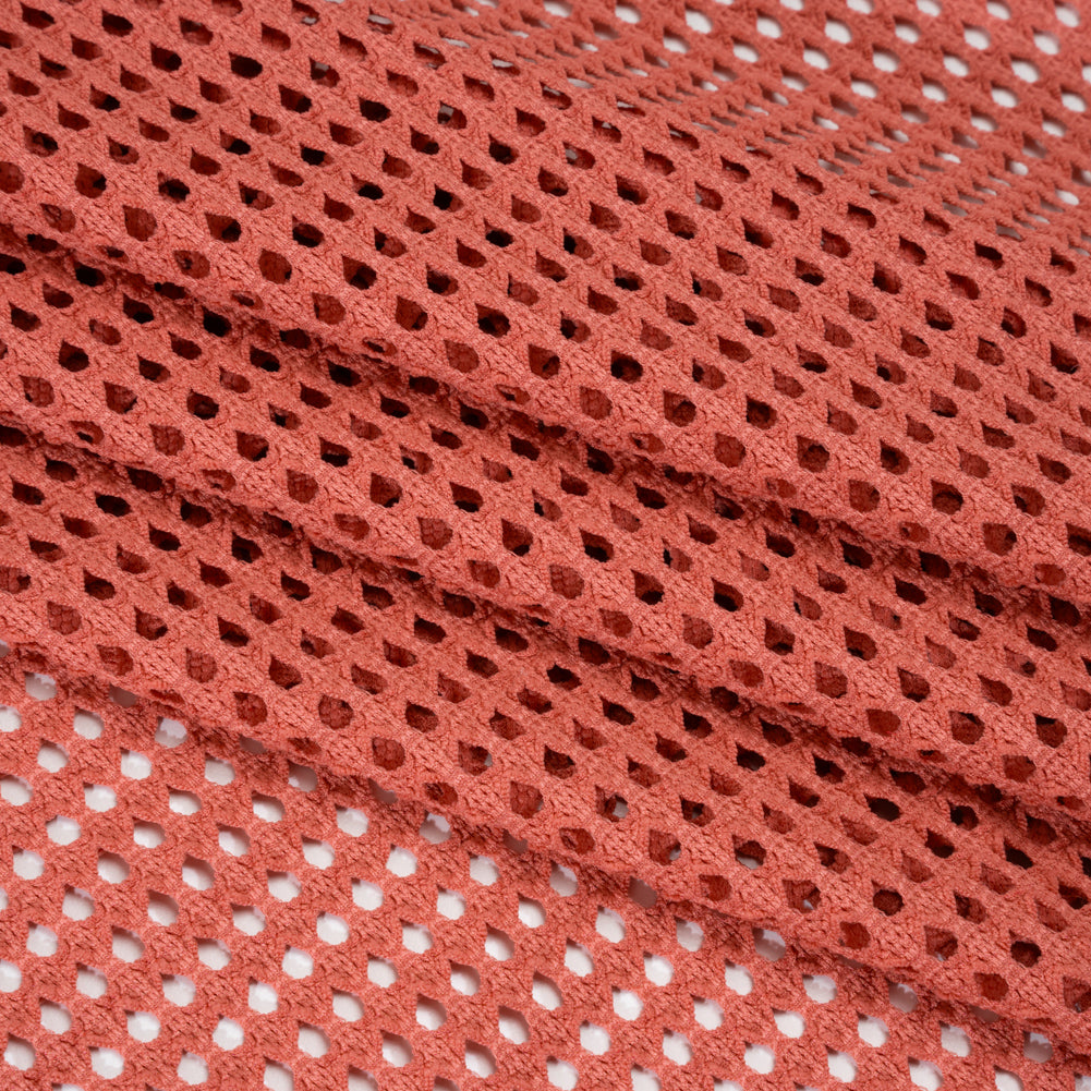 Stretch Polyester Eyelet Knit - Muted Coral Rows of Dots - Designer Deadstock Stretch Polyester Eyelet Knit - Muted Coral Rows of Dots - Designer Deadstock