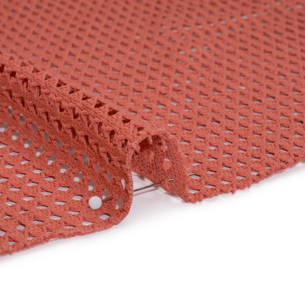 Stretch Polyester Eyelet Knit - Muted Coral Rows of Dots - Designer Deadstock Stretch Polyester Eyelet Knit - Muted Coral Rows of Dots - Designer Deadstock