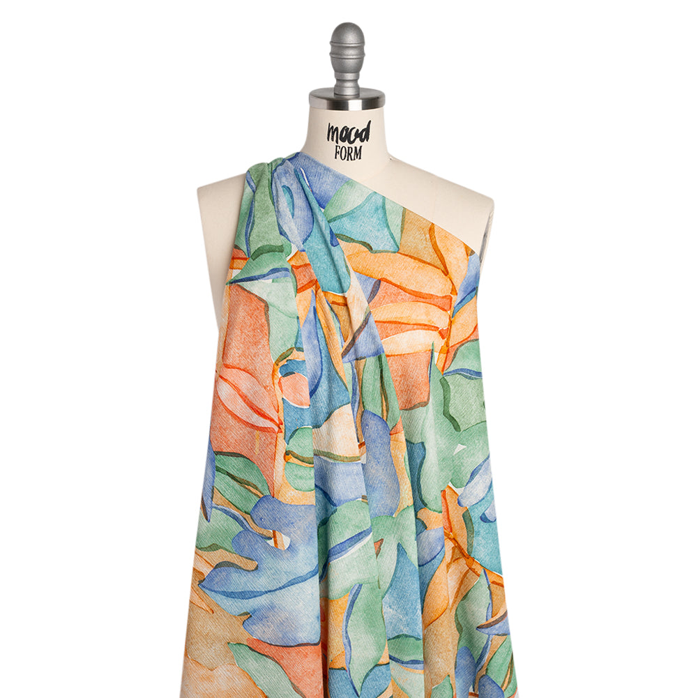 Slubbed Gauzy Cotton Woven - Green, Blue and Orange Watercolor Leaves - Mood Exclusive Cascading Canopy Print Slubbed Gauzy Cotton Woven - Green, Blue and Orange Watercolor Leaves - Mood Exclusive Cascading Canopy Print