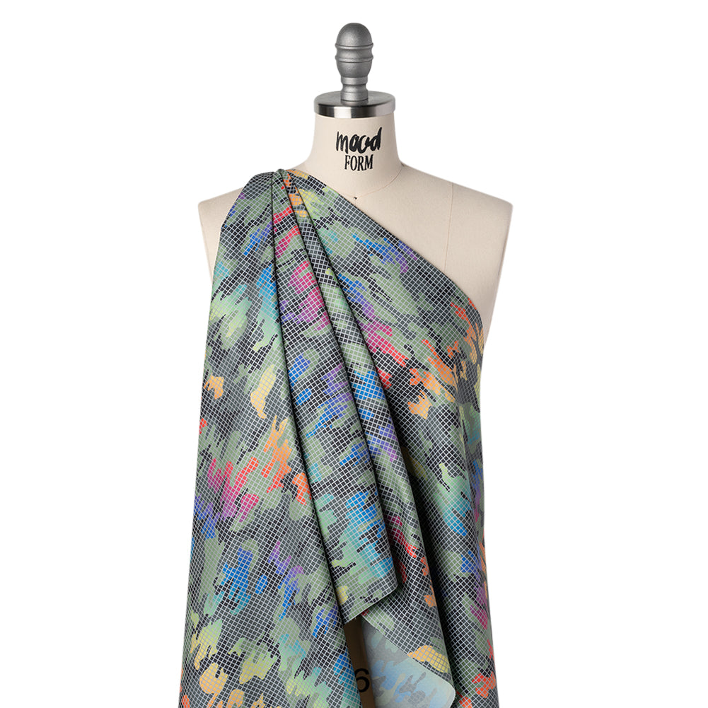 Reflective Print Fabric - Olive Green and Rainbow Camouflage with Silver Gray Grid Reflective Print Fabric - Olive Green and Rainbow Camouflage with Silver Gray Grid