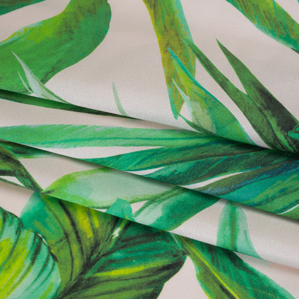 Silk Charmeuse Print 16MM, Made in Italy - Cream and Green Tropical Leaves Detail Silk Charmeuse Print 16MM, Made in Italy - Cream and Green Tropical Leaves Detail