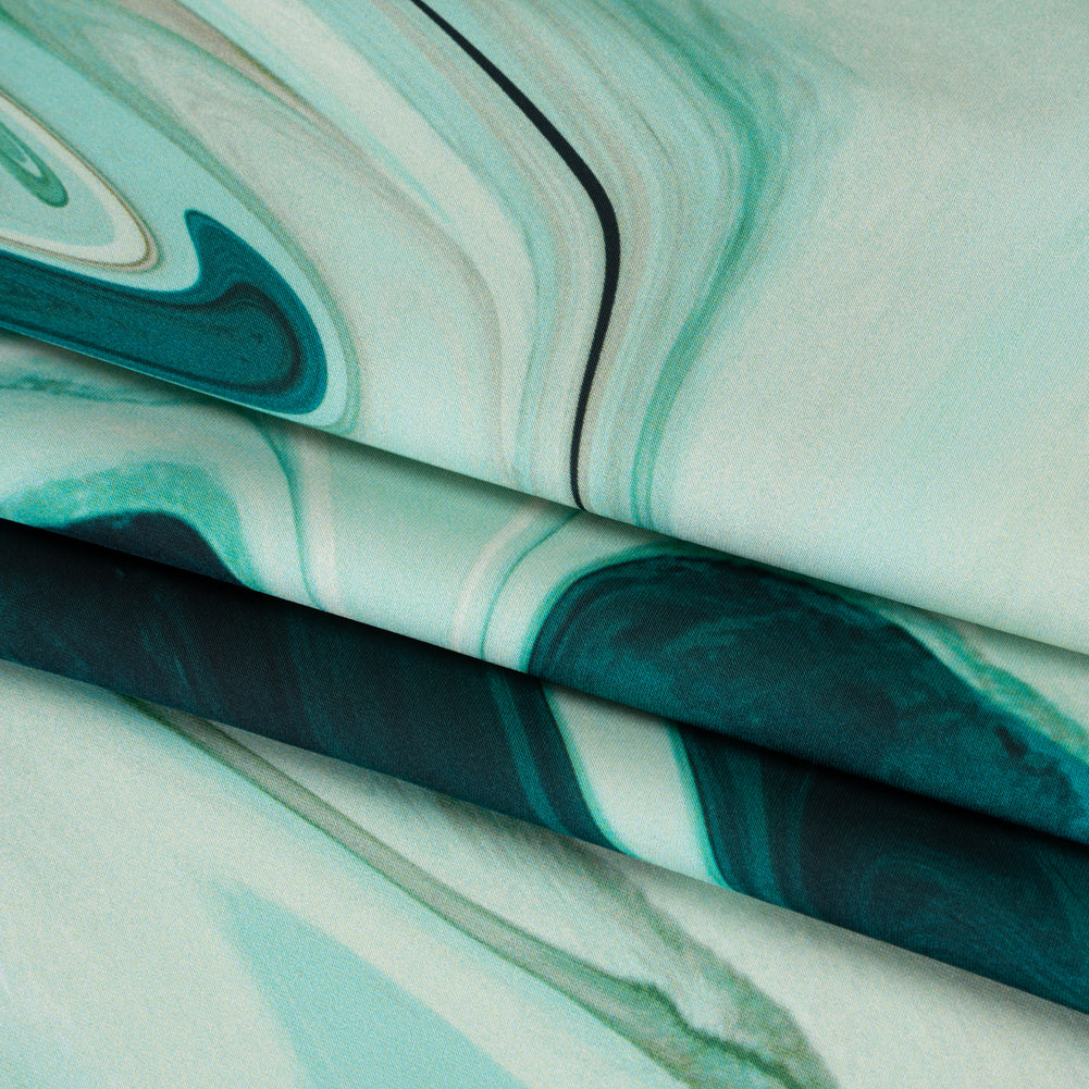 Polyester Satin - Sea Green and Beige Liquid Swirls - Mood Exclusive Liquid Motion Print Folded Polyester Satin - Sea Green and Beige Liquid Swirls - Mood Exclusive Liquid Motion Print Folded