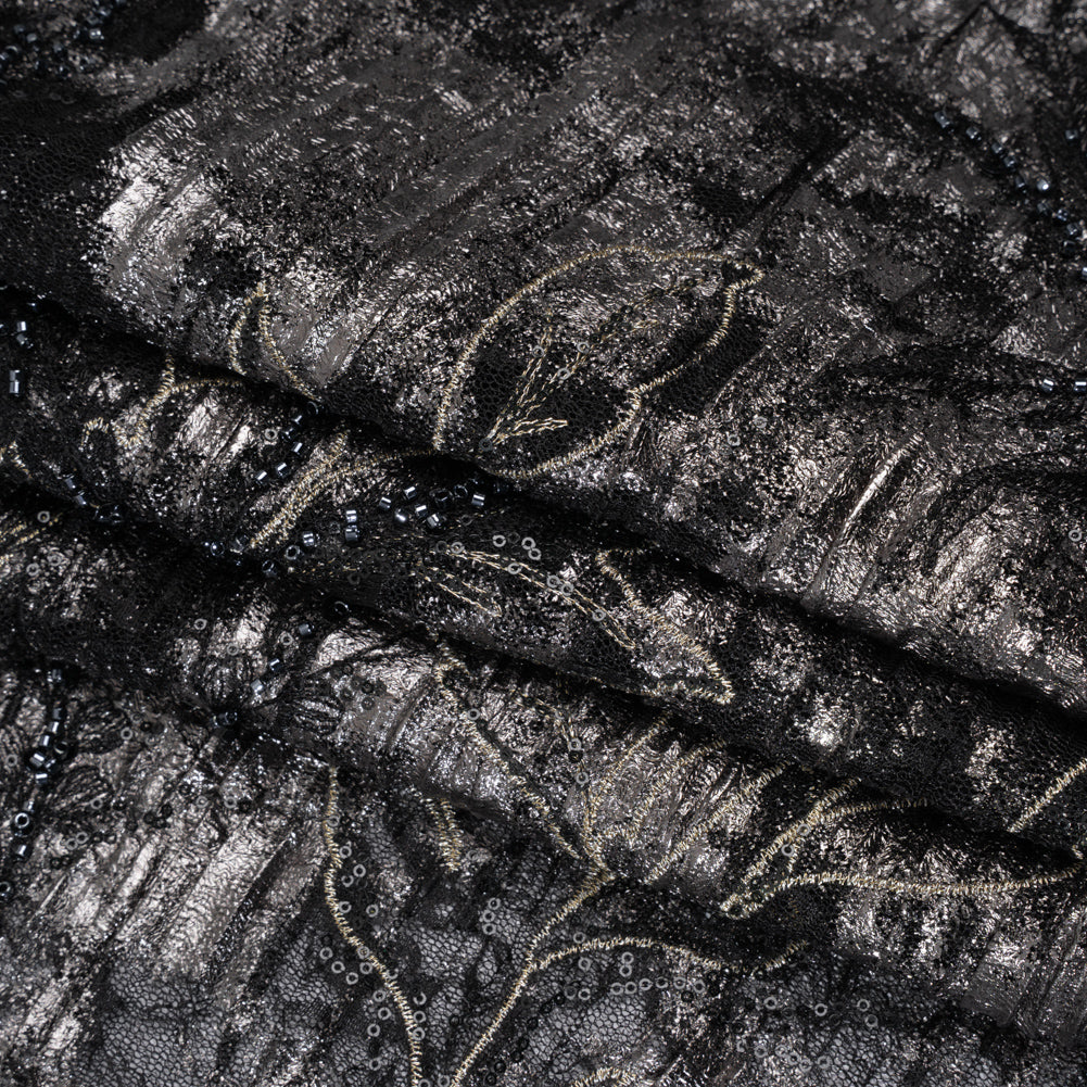 Metallic Foiled Plisse Lace with Embroidery and Beading on Tulle Backing - Black, Gunmetal and White Gold Trailing Leafy Vines Folded Metallic Foiled Plisse Lace with Embroidery and Beading on Tulle Backing - Black, Gunmetal and White Gold Trailing Leafy Vines Folded