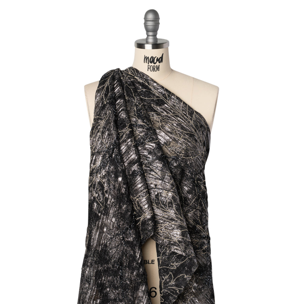 Metallic Foiled Plisse Lace with Embroidery and Beading on Tulle Backing - Black, Gunmetal and White Gold Trailing Leafy Vines Drape Metallic Foiled Plisse Lace with Embroidery and Beading on Tulle Backing - Black, Gunmetal and White Gold Trailing Leafy Vines Drape