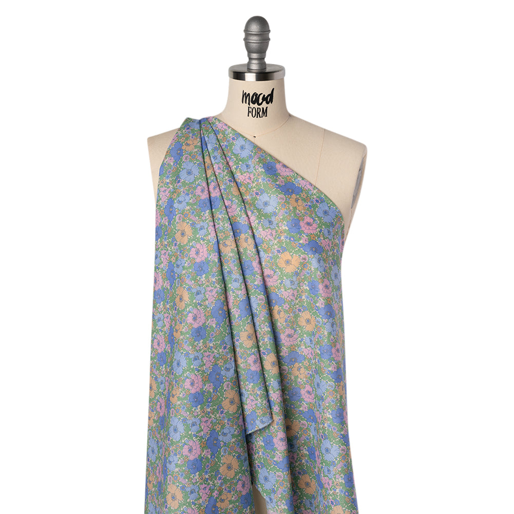 Liberty Fabrics Tana Lawn® - Meadow Song Multi Pastel - Light Blue, Baby Pink and Soft Green Flower Field Folded Liberty Fabrics Tana Lawn® - Meadow Song Multi Pastel - Light Blue, Baby Pink and Soft Green Flower Field Folded