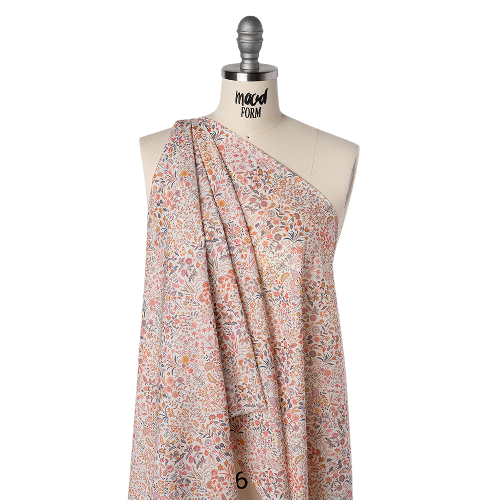 Liberty Fabrics Tana Lawn® - Shepherdly Song Pink - Pink, Peachy Orange and Blue-Gray Wildflowers - Folded Liberty Fabrics Tana Lawn® - Shepherdly Song Pink - Pink, Peachy Orange and Blue-Gray Wildflowers - Folded