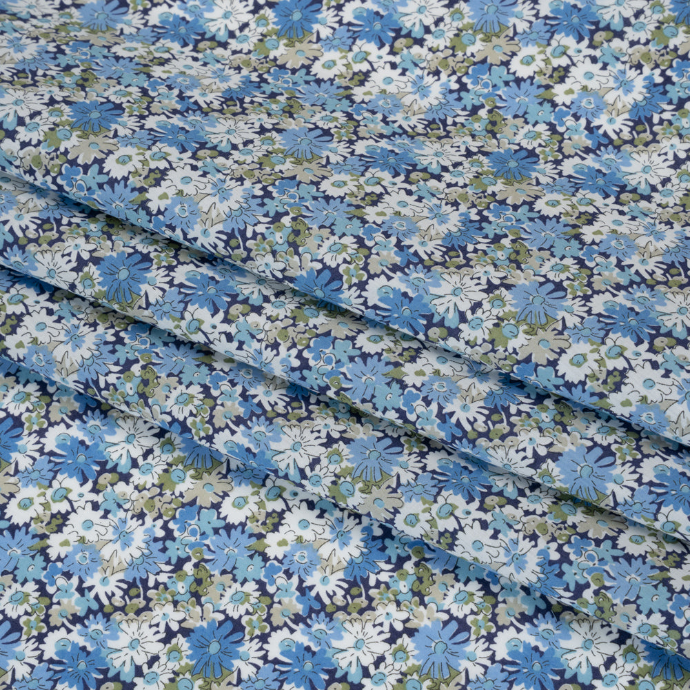 Liberty Fabrics Tana Lawn® - Libby Blue - Sky Blue, White and Sage Green Field of Daisies - Folded Liberty Fabrics Tana Lawn® - Libby Blue - Sky Blue, White and Sage Green Field of Daisies - Folded