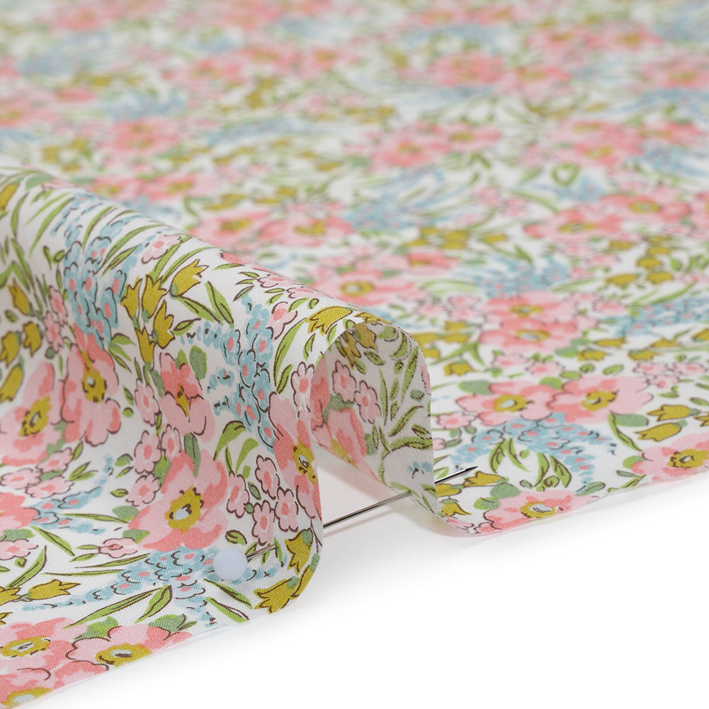 Liberty Fabrics Tana Lawn® - Swirling Petals Light Pink - Baby Pink, Blue and Yellow Green Floral Detail Liberty Fabrics Tana Lawn® - Swirling Petals Light Pink - Baby Pink, Blue and Yellow Green Floral Detail