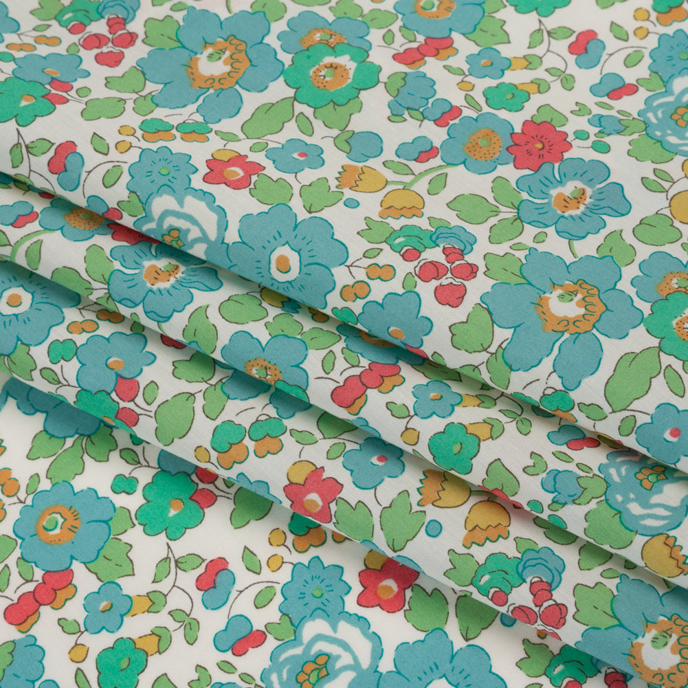 Liberty Fabrics Tana Lawn® - Betsy Blue Turquoise - Turquoise, Pink and Green Floral - Folded Liberty Fabrics Tana Lawn® - Betsy Blue Turquoise - Turquoise, Pink and Green Floral - Folded