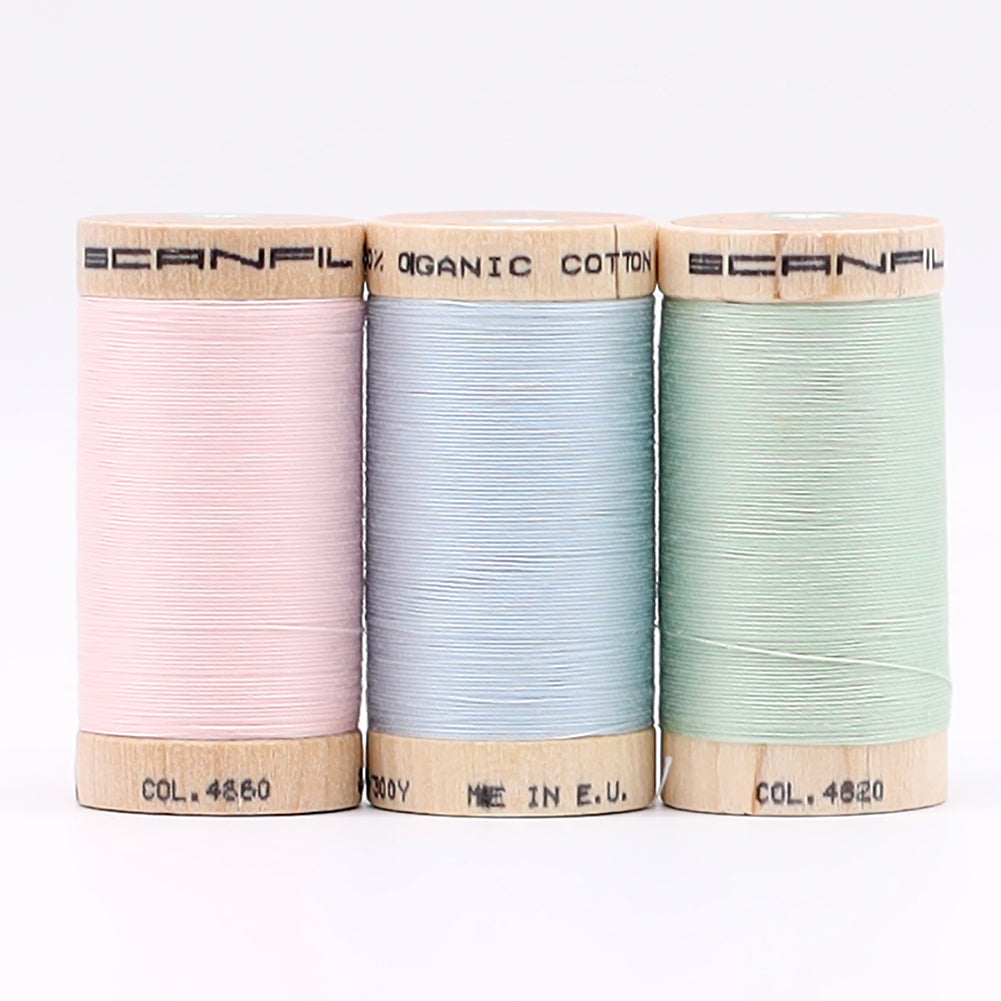 SCANFIL® 30wt Organic Pima Cotton Thread Trio Set - 3ct 300yd Spools - Baby Pastels - Detail SCANFIL® 30wt Organic Pima Cotton Thread Trio Set - 3ct 300yd Spools - Baby Pastels - Detail