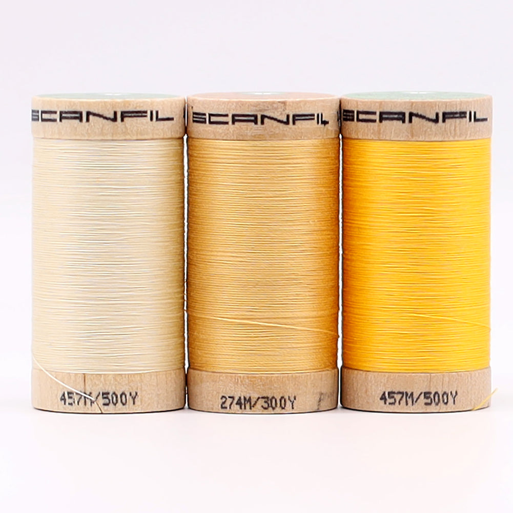 SCANFIL® 50wt Organic Pima Cotton Thread Trio Set - 3ct 500yd Spools - Sunshine Yellows Folded SCANFIL® 50wt Organic Pima Cotton Thread Trio Set - 3ct 500yd Spools - Sunshine Yellows Folded