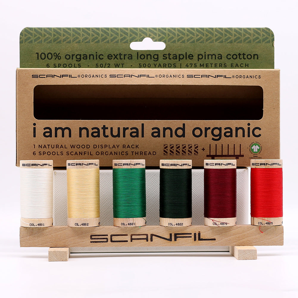 SCANFIL® 50wt Organic Pima Cotton Thread Set - 6ct 500yd Spools & Wood Rack - Holiday Traditions Folded SCANFIL® 50wt Organic Pima Cotton Thread Set - 6ct 500yd Spools & Wood Rack - Holiday Traditions Folded