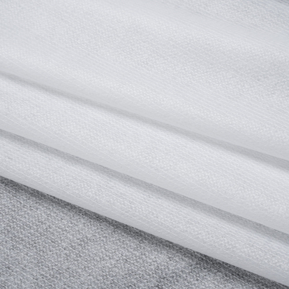 Non-Woven Fusible Interlining with Reinforced Threading - White - Deadstock Folded Non-Woven Fusible Interlining with Reinforced Threading - White - Deadstock Folded