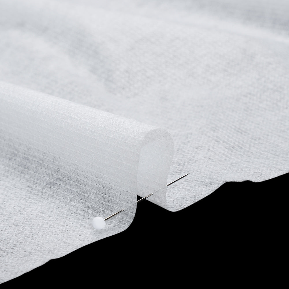 Non-Woven Fusible Interlining with Reinforced Threading - White - Deadstock Detail Non-Woven Fusible Interlining with Reinforced Threading - White - Deadstock Detail