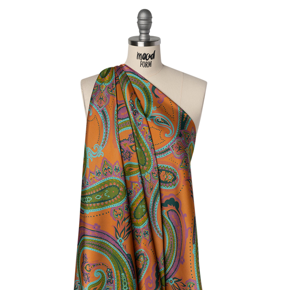 Polyester Satin - Pumpkin Orange, Jade Green and Purple Paisley - Mood Exclusive Swirling Sonata Print Polyester Satin - Pumpkin Orange, Jade Green and Purple Paisley - Mood Exclusive Swirling Sonata Print