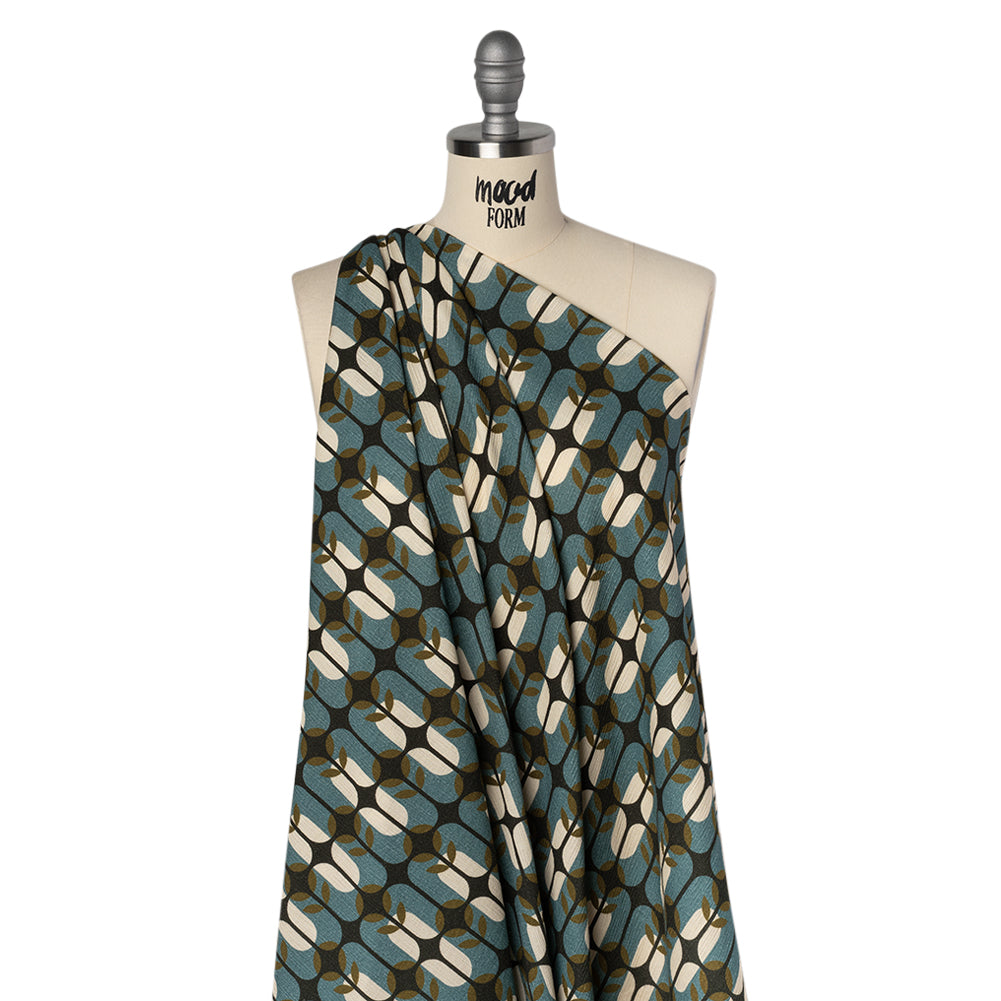 Slubbed Gauzy Cotton Woven - Mid Blue, Olive Green and Navy Geometric Floral Windows - Mood Exclusive Greenhouse Geometries Print Slubbed Gauzy Cotton Woven - Mid Blue, Olive Green and Navy Geometric Floral Windows - Mood Exclusive Greenhouse Geometries Print