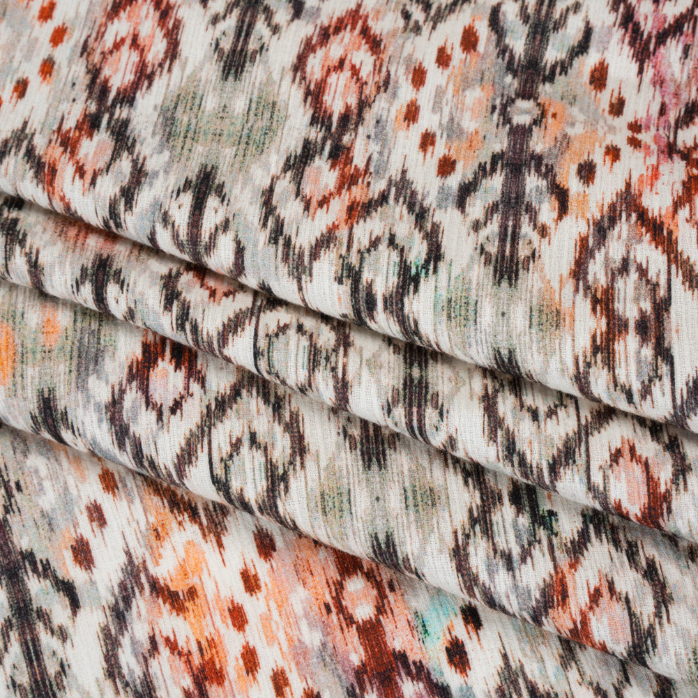 Slubbed Gauzy Cotton Woven - Red, Orange and Dark Green Geometric Ikat - Mood Exclusive Secret Symbols Print Slubbed Gauzy Cotton Woven - Red, Orange and Dark Green Geometric Ikat - Mood Exclusive Secret Symbols Print