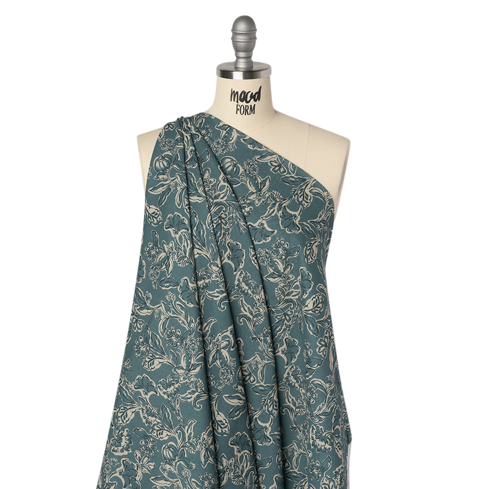 Crinkled Cotton Gauzy Woven - Sea Blue, Cream and Black Floral - Mood Exclusive Cottage Crawl Print Drape Crinkled Cotton Gauzy Woven - Sea Blue, Cream and Black Floral - Mood Exclusive Cottage Crawl Print Drape