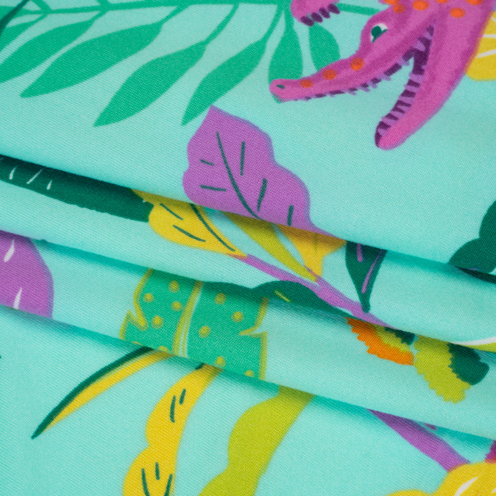 Stretch Polyester ITY Jersey Print - Aqua, Pink and Yellow Crocodiles and Palm Leaves - Deadstock Stretch Polyester ITY Jersey Print - Aqua, Pink and Yellow Crocodiles and Palm Leaves - Deadstock