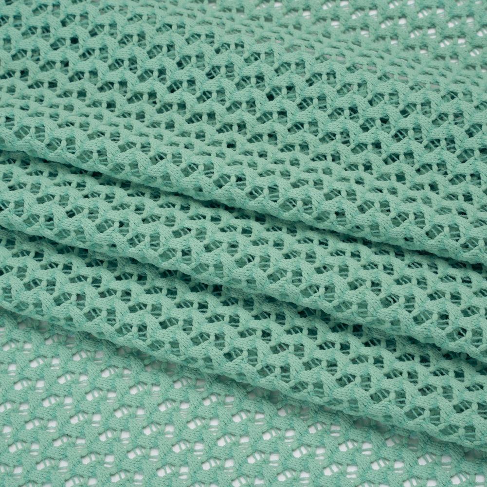 Stretch Polyester Eyelet Knit by Montce - Dark Mint Zig Zags - Designer Deadstock - Folded Stretch Polyester Eyelet Knit by Montce - Dark Mint Zig Zags - Designer Deadstock - Folded