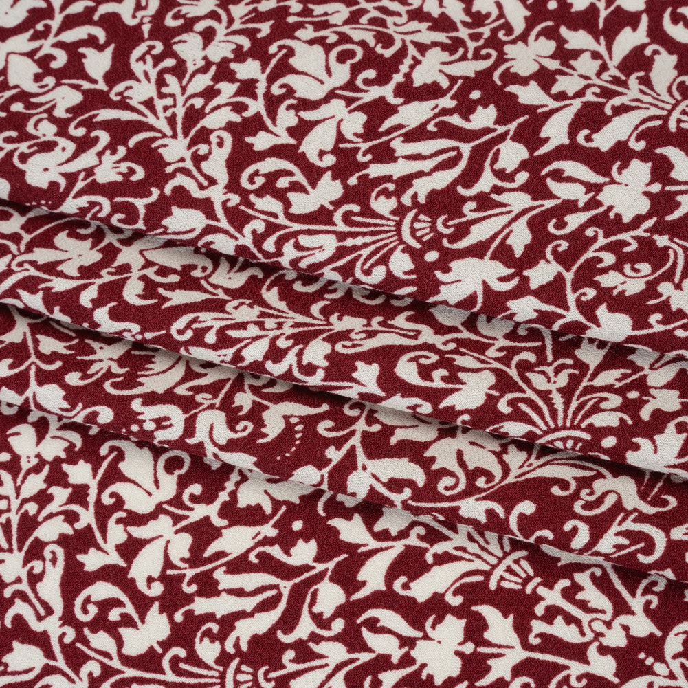 Sustainable Viscose Crepe Print by The Reformation - Deep Ruby Red and White Victorian Foliage - Deadstock - Folded Sustainable Viscose Crepe Print by The Reformation - Deep Ruby Red and White Victorian Foliage - Deadstock - Folded